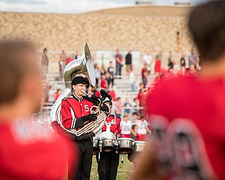 DIANNA OATRIDGE | THE VINDICATOR A Stuthers band member plays the sousaphone during the pregame festivites at the Niles vs Struthers football game on Friday night.