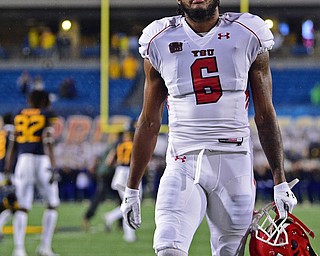 MORGANTOWN, WEST VIRGINIA - SEPTEMBER 8, 2018: Youngstown State's Kendrick Mallory walks off the field after Youngstown State was defeated 52-17 by West Virginia, Saturday night. DAVID DERMER | THE VINDICATOR