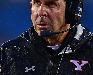 MORGANTOWN, WEST VIRGINIA - SEPTEMBER 8, 2018: Youngstown State head coach Bo Pelini looks at the scoreboard during the first half of their game, Saturday night. DAVID DERMER | THE VINDICATOR