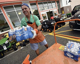 Chris Rayner helps customers load their cars as they buy supplies at The Home Depot. Preparations for Florence were intensifying up and down the densely populated coast. Since reliable record-keeping began more than 150 years ago, North Carolina has been hit by only one Category 4 hurricane: Hazel, with 130 mph winds, in 1954.