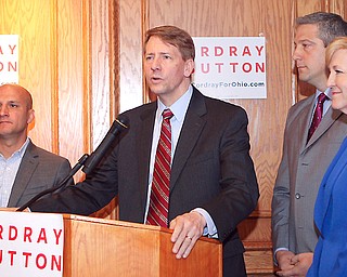 Richard Cordray, a former state treasurer and attorney general who is now the Democratic candidate for Ohio governor,  met with United Auto Workers union retirees Monday at the Mahoning Country Club. In this file photo are Betty Sutton, right, his lieutenant governor running mate; U.S. Rep. Tim Ryan of Howland, D-13th; and state Rep. John Boccieri of Poland, D-59th, at left.