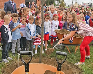 Teacher Tami Socie and Stadium Drive Elementary students joined members of the Boardman fire and police departments on Tuesday at the new fire station for the planting of a purple plum tree on 9/11. The station is also the future site of a memorial for first responders.