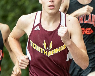 DIANNA OATRIDGE | THE VINDICATOR First place finisher Nick Millison from South Range runs during the  Suburban Cross Country meet at Austintown Park on Tuesday.
