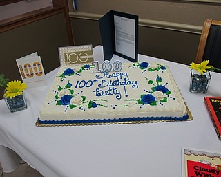 Neighbors | Jessica Harker.The members of the Brookdale Senior Living facility staff bought a cake for residents to celebrate Betty Leo's 100th birthday.