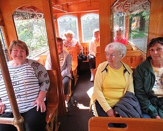Neighbors | Jessica Harker.Community members waited on the trolley for the tour to start on Aug. 22.