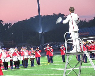Neighbors | Jessica Harker.Senior Drum Major Nick Matussi directed the Austintown Fitch marching band on Aug. 27 for the 47th Band Night.