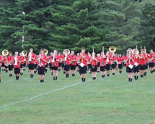 Neighbors | Abby Slanker.The Cardinal pride marching band warned up before performing for the crowd at the Canfield Community Tailgate on Sept. 7.