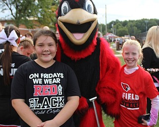 Neighbors | Abby Slanker.Canfield’s school mascot, Big Red, greeted students after arriving at the Canfield Community Tailgate on Sept. 7.