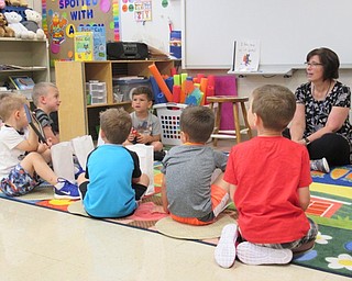 Neighors | Jessica Harker .Preschool teacher Terry Wittenauer instructed students Sept. 7 during their weekly preschool class at Poland Union Elementary.