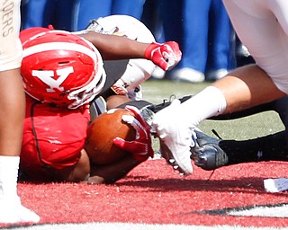 Youngstown's Tevin McCaster falls back to score a touchdown during the first half of their game against Valparaiso on Saturday at Stambaugh Stadium. EMILY MATTHEWS | THE VINDICATOR