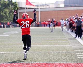 Youngstown's Natavious Payne celebrates after scoring a touchdown during the first half of their game against Valparaiso on Saturday at Stambaugh Stadium. EMILY MATTHEWS | THE VINDICATOR