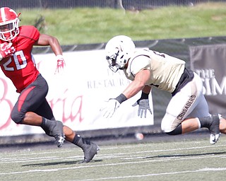 Youngstown's Christian Turner tries to get past Valparaiso's Drew Snouffer during the first half of their game on Saturday at Stambaugh Stadium. EMILY MATTHEWS | THE VINDICATOR