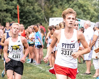 DIANNA OATRIDGE | THE VINDICATOR Austintown Fitch's Derek Phillips leads a group of runners  during the Boardman Spartan Invitational Cross Country meet at Boardman High School on Saturday.