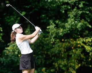 Marlie McConnell, with the Poland girls golf team, drives her ball during the Christine Terlesky Lake Club Girls High School Golf Invitational on Sunday. EMILY MATTHEWS | THE VINDICATOR