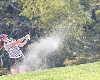 Avery Wright, with the Jackson girls golf team, hits her ball during the Christine Terlesky Lake Club Girls High School Golf Invitational on Sunday. EMILY MATTHEWS | THE VINDICATOR