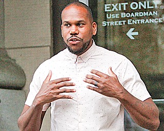  ROBERT K.YOSAY  | THE VINDICATOR.. City officials kicking off ÒReclaiming Our IdentityÓ initiative at 8 a.m. on anniversary of ÒBlack MondayÓ and the closure of area steel mills, on the city hall steps. Officials invited area entrepreneurs and Òmovers and shakersÓ to highlight the cityÕs economic recovery..Derrick McDowell- MC of the event tells about his feelings for the city and region...