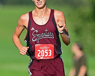 CANFIELD, OHIO - SEPTEMBER 19, 2018: Boardman's Mitchel Dunham runs to the finish line during the 2018 Suburban Cross Country meet, Wednesday afternoon at the Canfield Fairgrounds. DAVID DERMER | THE VINDICATOR