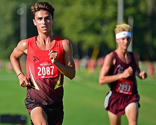 CANFIELD, OHIO - SEPTEMBER 19, 2018: Canfield's Giovanni Copploe runs during the 2018 Suburban Cross Country meet, Wednesday afternoon at the Canfield Fairgrounds. DAVID DERMER | THE VINDICATOR