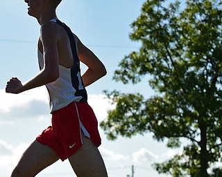 CANFIELD, OHIO - SEPTEMBER 19, 2018: Fitch's Serek Sletcold runs during the 2018 Suburban Cross Country meet, Wednesday afternoon at the Canfield Fairgrounds. DAVID DERMER | THE VINDICATOR