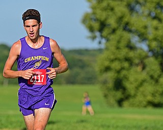 CANFIELD, OHIO - SEPTEMBER 19, 2018: Champion's Joe Abramovich runs during the 2018 Suburban Cross Country meet, Wednesday afternoon at the Canfield Fairgrounds. DAVID DERMER | THE VINDICATOR