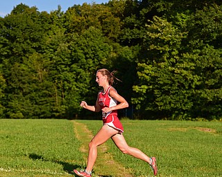 CANFIELD, OHIO - SEPTEMBER 19, 2018: Badger's Miranda Stanhope runs to the finish line during the 2018 Suburban Cross Country meet, Wednesday afternoon at the Canfield Fairgrounds. DAVID DERMER | THE VINDICATOR