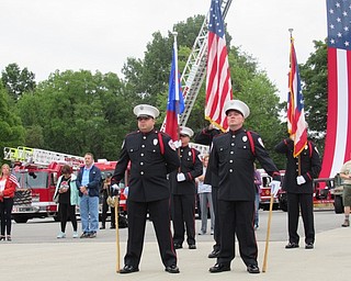 Neighbors | Jessica Harker .The Austintown Fire Department Honor Gaurd performed the Posting of the Colors at the Sept. 11 memorial event in Austintown.