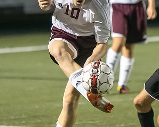 DIANNA OATRIDGE | THE VINDICATOR Boardman's Brian Yauger kicks the ball downfield during their 4-1 victory over Canfield at Bob Dove Field on Thursday.