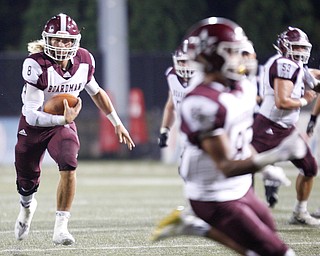 Boardman's Mike O'Horo runs with the ball during Boardman's game against Cardinal Mooney at Stambaugh Stadium on Friday. EMILY MATTHEWS | THE VINDICATOR