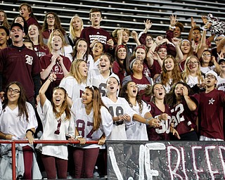 Boardman's student section cheers during the first half of their game against Cardinal Mooney at Stambaugh Stadium on Friday. EMILY MATTHEWS | THE VINDICATOR