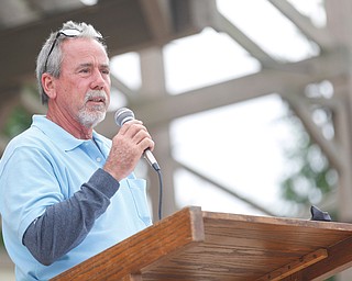 Gino Zimmer, the father of Nicholaus E. Zimmer, of the U.S. Army who lost his life in Kufa, Iraq in 2004, speaks about how his son changed his life at the closing ceremonies for the traveling memorial Sunday. EMILY MATTHEWS | THE VINDICATOR