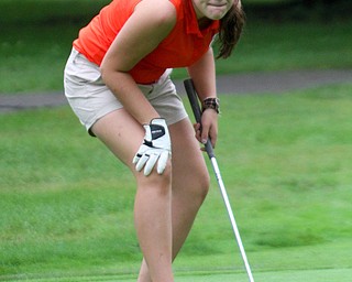 William D. Lewis The Vindicator East Palestine's Morgan Rutledge watches her putt during 9-26-18 action at Pine Lakes.