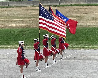 Neighbors | Jessica Harker.The Austintown Marching Band flag line marched during the Canfield Fair high school band demonstrations August 30.