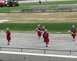 Neighbors | Jessica Harker.The Austintown Marching Band rifle line performed during the Canfield Fair August 30.