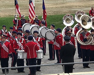 Neighbors | Jessica Harker.Austintown Band Director Wes O'Connor stood in front of the band during the demonstrations at the Canfield Fair August 30.