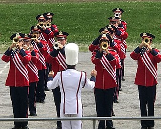 Neighbors | Jessica Harker.Senior Drum Major Nick Mattiussi directed the band during their demonstration at the Canfield Fair August 30.