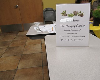 Neighbors | Jessica Harker.A flyer depicting the information about the class was set up on the table infront of insturctor Pam Baytos on Sept. 11.