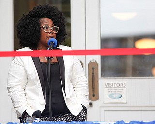 Monica Jones, the principal of the new Youngstown Rayen Early College High School, speaks before the ribbon cutting for the new school on Thursday.