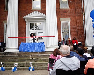 Monica Jones, the principal of the new Youngstown Rayen Early College High School, speaks before the ribbon cutting for the new school on Thursday.