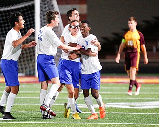 Hubbard celebrates after AJ Trobek (10) scores during the first half of their game at South Range on Thursday. EMILY MATTHEWS | THE VINDICATOR