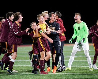 South Range celebrates after Canaan Johnson scores with seconds left in the first half of their game against Hubbard at South Range on Thursday. EMILY MATTHEWS | THE VINDICATOR