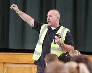  ROBERT K.YOSAY  | THE VINDICATOR..Sgt Chris Moffitt -  shows the weaponry that will be used in the training session.. The Eagle Joint Fire District in conjunction with the Hubbard City Police, Hubbard TWP Police, other area safety forces  including Mercy Health Hospitals and Trumbull Memorial Hospital, St. PatrickÕs Parish Center in Hubbard, Ohio...