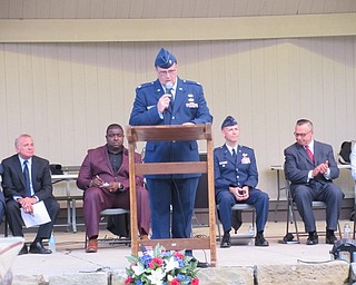 Neighbors | Jessica Harker .Retired Lieutenant Colonel Angelo Nuzzo welcomed community members to the opening ceremony of the Ohio Flags of Honor memorial on Sept. 21.