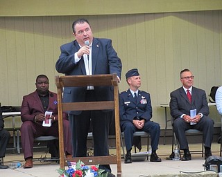 Neighbors | Jessica Harker.Mahoning County Commissioner Anthony Traficanti spoke during the opening ceremony of the Ohio Flags of Honor memorial Sept. 21 at Boardman Park.