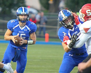 William D. Lewis The Vindicator Poland QB Cole Kosco(16) during 9-28-18 game with Struthers.