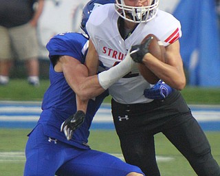 William D. Lewis The VindicatorStruthers Carson Ryan(2) is stopped by Poland's Blake Wilson(2)during 9-28-18 action at Poland.