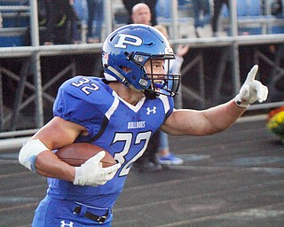 William D. Lewis The Vindicator Poland's Jake Rutana(32)reacts after scoring during 9-28-18 action at Poland.