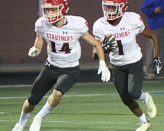 William D. Lewis The Vindicator Struthers's Keyshawn Chrism(1) and Aiden Hall(14) during 9-28-18 action at Poland