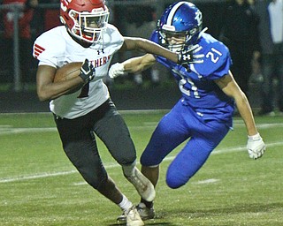 William D. Lewis The vindicator  Struthers Keyshawn Chism(1) eludes Poland'sDean Gessler(21).