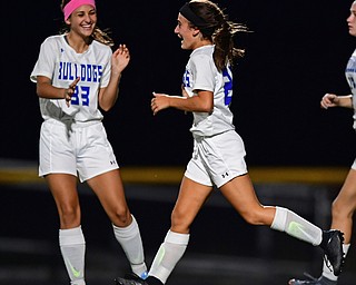 NORTH LIMA, OHIO - OCTOBER 1, 2018: Poland's Mia Marantis, right, is congratulated by Bella Milano after scoring a goal during the second half of their game, Monday night at South Range High School. DAVID DERMER | THE VINDICATOR