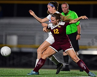 NORTH LIMA, OHIO - OCTOBER 1, 2018: South Range's Rachel Maynard and Poland's Kate Dodge fight for position while playing the ball during the second half of their game, Monday night at South Range High School. DAVID DERMER | THE VINDICATOR...Poland's Dodge was the only #9 on either the varsity or JV roster.